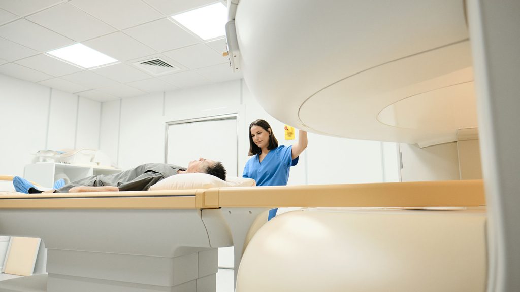 Nurse Performing MRI Procedure