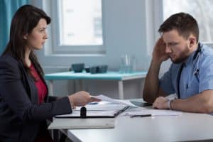 Lawyer In Doctor's Office