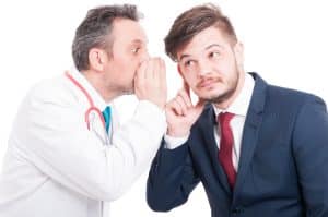 Male Doctor Whispering