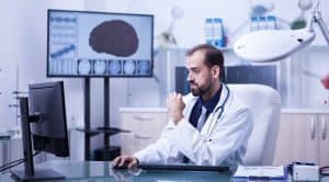 Doctor working on computer